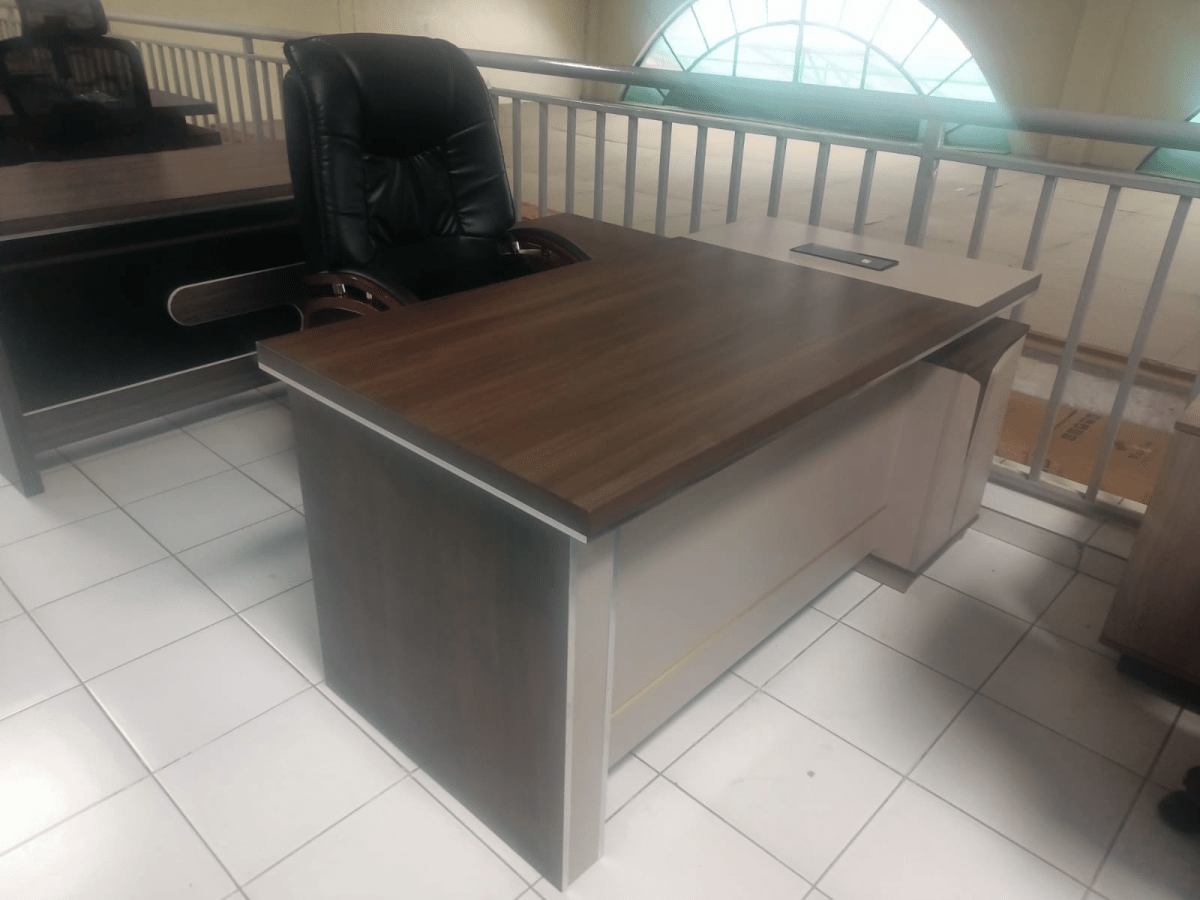 gucca l-shaped executive office desk, l-shaped executive desk, gucca executive office desk, modern l-shaped office desk, contemporary executive l-shaped desk, luxury l-shaped office desk, premium executive office desk, director l-shaped office desk, CEO office l-shaped desk, manager office l-shaped desk, corporate executive l-shaped desk, professional l-shaped office desk, executive workstation l-shaped desk, modular l-shaped office desk, spacious executive office desk, ergonomic l-shaped executive desk, high-end l-shaped office desk, sturdy l-shaped executive desk, durable executive office desk, heavy-duty l-shaped office desk, solid wood l-shaped desk, MDF l-shaped office desk, laminated l-shaped executive desk, veneer finish l-shaped desk, scratch-resistant l-shaped office desk, moisture-resistant l-shaped desk, imported style l-shaped executive desk, showroom quality l-shaped desk, catalog ready executive office desk, affordable l-shaped executive desk, value-for-money l-shaped office desk, neutral color l-shaped desk, walnut l-shaped executive desk, mahogany l-shaped office desk, oak finish l-shaped desk, black l-shaped executive desk, white modern l-shaped desk, executive desk for corporate offices, executive desk for private offices