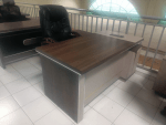 gucca l-shaped executive office desk, l-shaped executive desk, gucca executive office desk, modern l-shaped office desk, contemporary executive l-shaped desk, luxury l-shaped office desk, premium executive office desk, director l-shaped office desk, CEO office l-shaped desk, manager office l-shaped desk, corporate executive l-shaped desk, professional l-shaped office desk, executive workstation l-shaped desk, modular l-shaped office desk, spacious executive office desk, ergonomic l-shaped executive desk, high-end l-shaped office desk, sturdy l-shaped executive desk, durable executive office desk, heavy-duty l-shaped office desk, solid wood l-shaped desk, MDF l-shaped office desk, laminated l-shaped executive desk, veneer finish l-shaped desk, scratch-resistant l-shaped office desk, moisture-resistant l-shaped desk, imported style l-shaped executive desk, showroom quality l-shaped desk, catalog ready executive office desk, affordable l-shaped executive desk, value-for-money l-shaped office desk, neutral color l-shaped desk, walnut l-shaped executive desk, mahogany l-shaped office desk, oak finish l-shaped desk, black l-shaped executive desk, white modern l-shaped desk, executive desk for corporate offices, executive desk for private offices