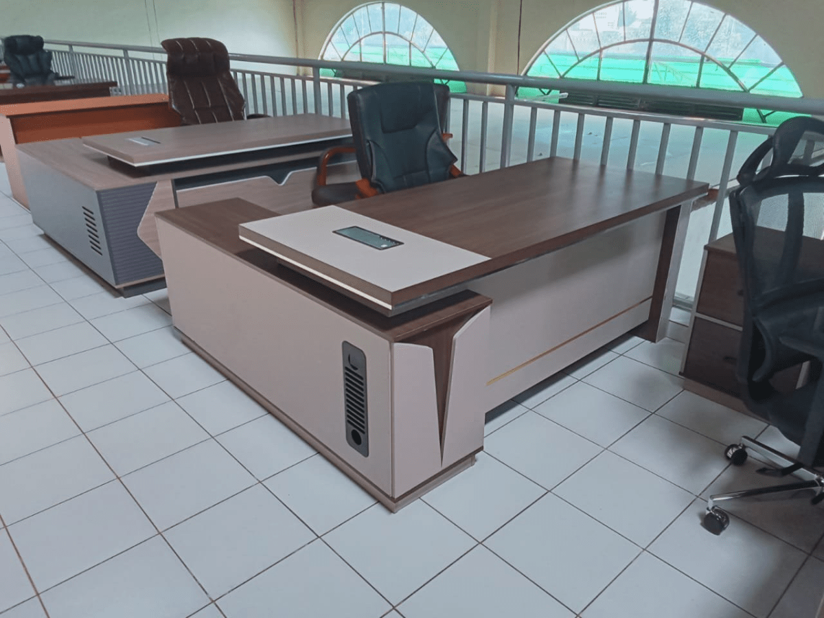 gucca l-shaped executive office desk, l-shaped executive desk, gucca executive office desk, modern l-shaped office desk, contemporary executive l-shaped desk, luxury l-shaped office desk, premium executive office desk, director l-shaped office desk, CEO office l-shaped desk, manager office l-shaped desk, corporate executive l-shaped desk, professional l-shaped office desk, executive workstation l-shaped desk, modular l-shaped office desk, spacious executive office desk, ergonomic l-shaped executive desk, high-end l-shaped office desk, sturdy l-shaped executive desk, durable executive office desk, heavy-duty l-shaped office desk, solid wood l-shaped desk, MDF l-shaped office desk, laminated l-shaped executive desk, veneer finish l-shaped desk, scratch-resistant l-shaped office desk, moisture-resistant l-shaped desk, imported style l-shaped executive desk, showroom quality l-shaped desk, catalog ready executive office desk, affordable l-shaped executive desk, value-for-money l-shaped office desk, neutral color l-shaped desk, walnut l-shaped executive desk, mahogany l-shaped office desk, oak finish l-shaped desk, black l-shaped executive desk, white modern l-shaped desk, executive desk for corporate offices, executive desk for private offices