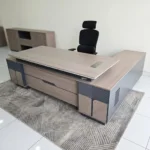 Executive Desk Supplier in Kenya. office desk, executive office desk, office desk Kenya, modern office desk, wooden office desk, office furniture, executive furniture, computer desk, study desk, workstation desk, office workstation, ergonomic office desk, manager desk, CEO office desk, director office desk, home office desk, commercial office desk, office table, writing desk, professional office desk, office desk with drawers, office desk with storage, L-shaped office desk, executive workstation, office desk Nairobi, affordable office desk, luxury office desk, contemporary office desk, office desk for sale, durable office desk, office furniture Kenya, corporate office desk, employee workstation, office setup furniture, business office desk, office desk supplier Kenya, office desk price Kenya, modern workstation desk, wooden workstation, office interior furniture, office desk online, office desk design, office desk cabinet, office desk with lockable drawers, premium office desk, compact office desk, large office desk, office desk solutions, office desk manufacturers, office desk shop Kenya, best office desk Kenya, executive workspace furniture, office desk and chair, professional workstation furniture, office desk accessories, custom office desk, office furniture store Nairobi, quality office desk, ergonomic workstation furniture, office desk deals Kenya, office desk for executives, office desk for managers, office desk for staff, stylish office desk, office productivity furniture, modern business furniture, office desk installation Kenya, office desk supplier Nairobi, office furniture showroom Kenya, workspace furniture solutions.
