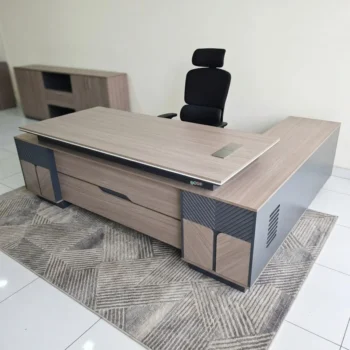 Executive Desk Supplier in Kenya. office desk, executive office desk, office desk Kenya, modern office desk, wooden office desk, office furniture, executive furniture, computer desk, study desk, workstation desk, office workstation, ergonomic office desk, manager desk, CEO office desk, director office desk, home office desk, commercial office desk, office table, writing desk, professional office desk, office desk with drawers, office desk with storage, L-shaped office desk, executive workstation, office desk Nairobi, affordable office desk, luxury office desk, contemporary office desk, office desk for sale, durable office desk, office furniture Kenya, corporate office desk, employee workstation, office setup furniture, business office desk, office desk supplier Kenya, office desk price Kenya, modern workstation desk, wooden workstation, office interior furniture, office desk online, office desk design, office desk cabinet, office desk with lockable drawers, premium office desk, compact office desk, large office desk, office desk solutions, office desk manufacturers, office desk shop Kenya, best office desk Kenya, executive workspace furniture, office desk and chair, professional workstation furniture, office desk accessories, custom office desk, office furniture store Nairobi, quality office desk, ergonomic workstation furniture, office desk deals Kenya, office desk for executives, office desk for managers, office desk for staff, stylish office desk, office productivity furniture, modern business furniture, office desk installation Kenya, office desk supplier Nairobi, office furniture showroom Kenya, workspace furniture solutions.